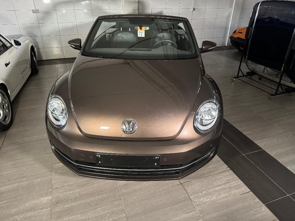 Volkswagen New Beetle metaalbruin Cab 1.2 TSI, Voorwielaandrijving, Beetle (Kever), 4 cilinders, Handgeschakeld