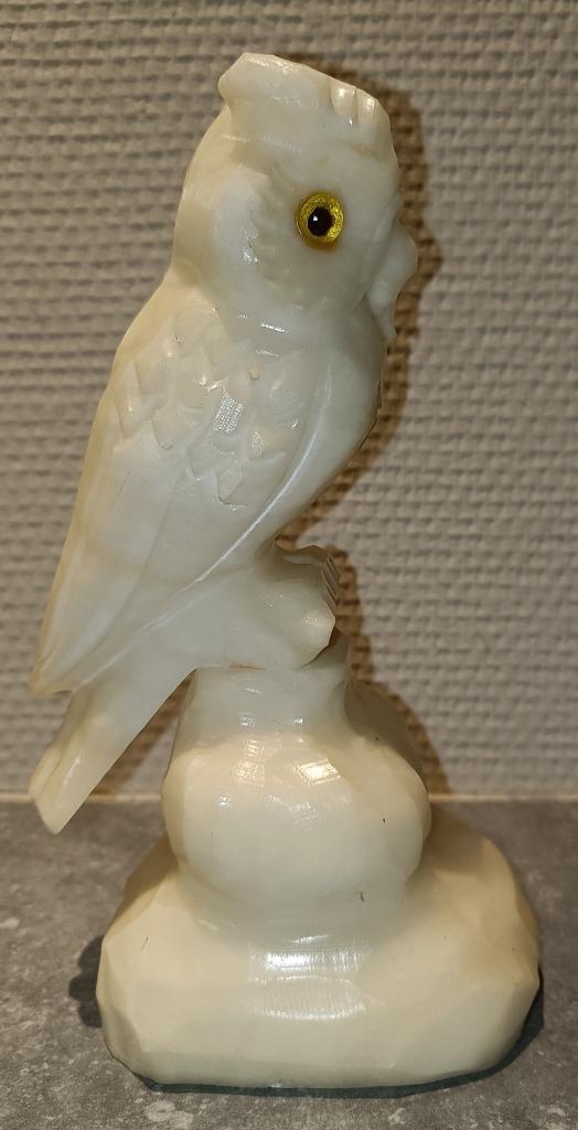 Albasten beeldje - uil, Ophalen