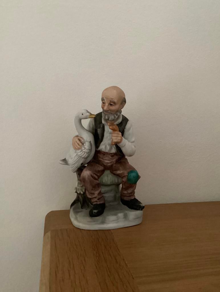 Oude man met eend in biscuit, Enlèvement, Comme neuf