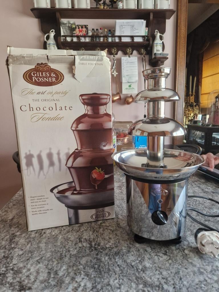 Giles & posner chocolade fontein, Ophalen