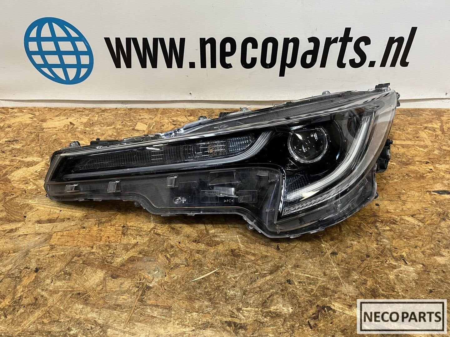 TOYOTA COROLLA ESTATE KOPLAMP LINKS 81150-02S70 ORGINEEL, Gebruikt, -, -, Ophalen of Verzenden