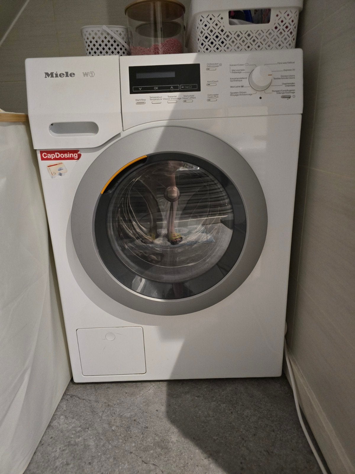 Miele wasmachine, Enlèvement