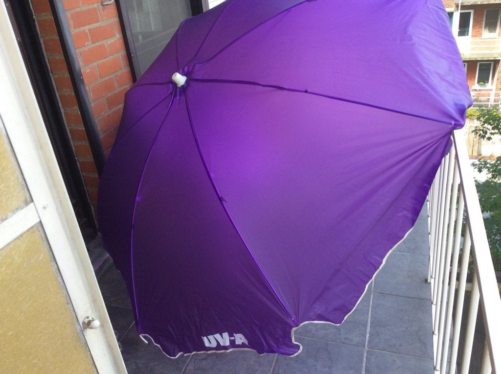 Zonnescherm  ( toch kan men bruinen eronder), Ophalen, Nieuw