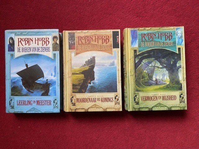 ROBIN HOBB DE ZIENERS DE COMPLETE TRILOGIE IN GOEDE GELEZEN, Enlèvement ou Envoi