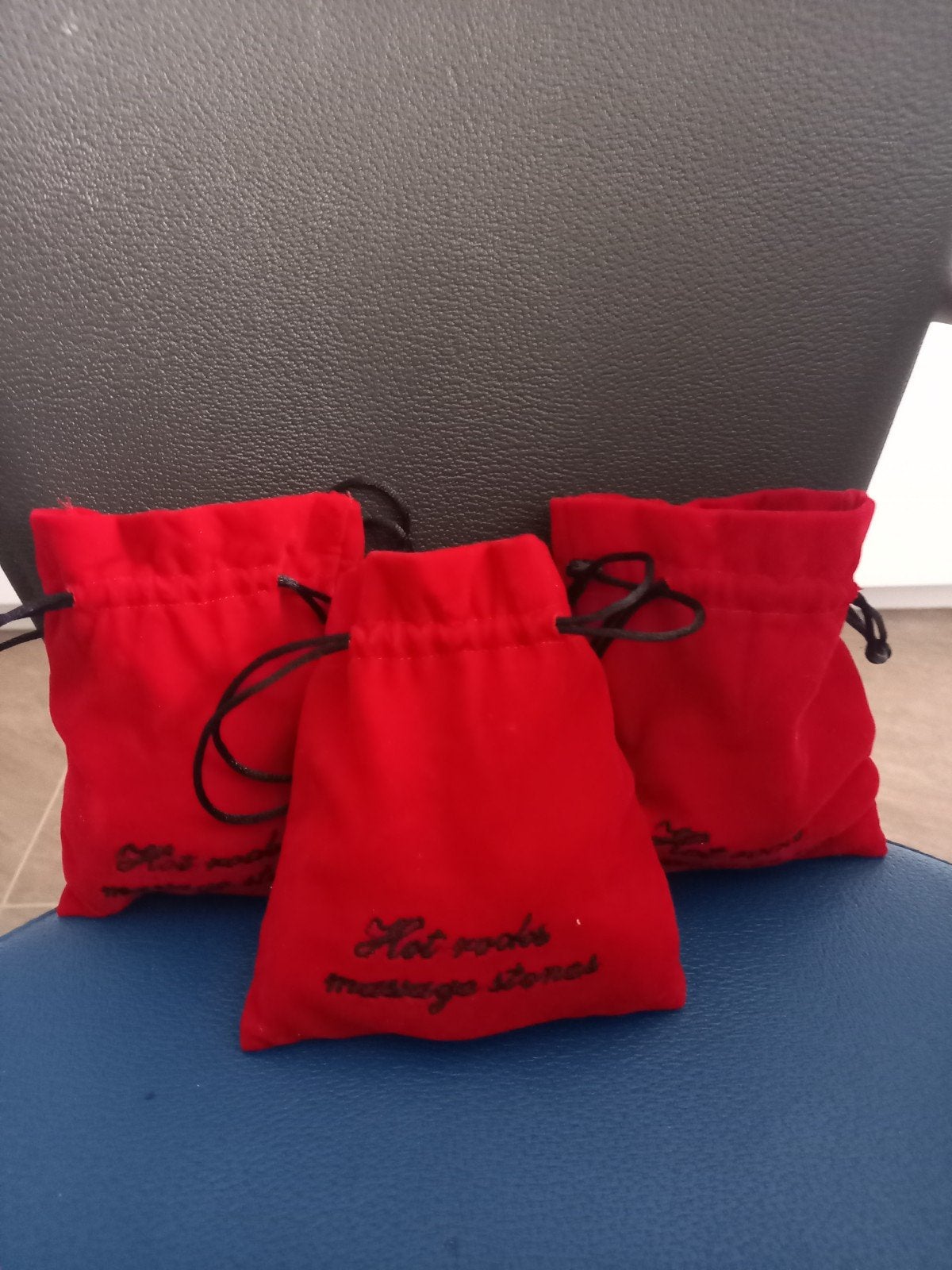 Massageolieflessen + hot-stone stenen, Ophalen
