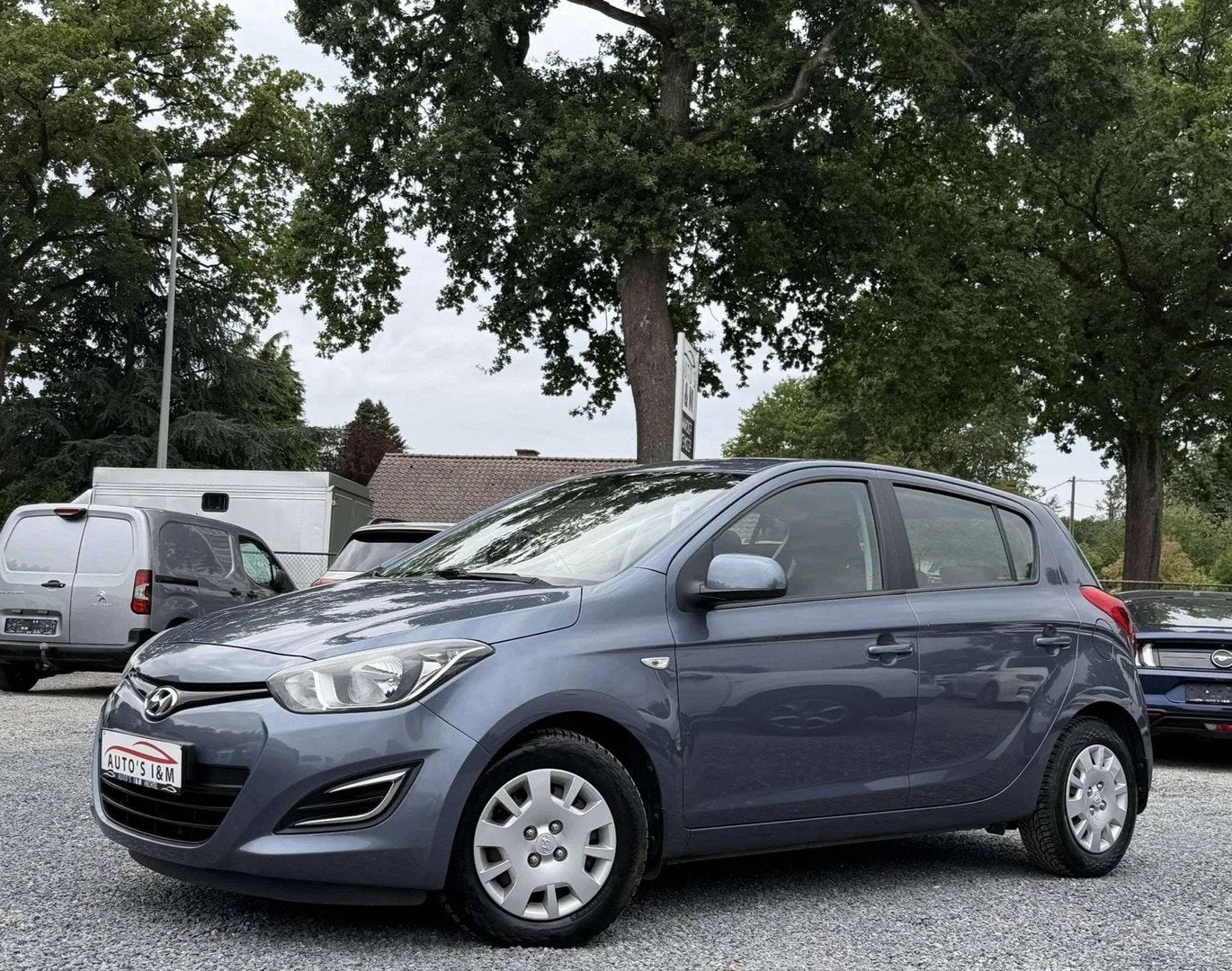 Hyundai i20 1.2i Benzine 2013 Airco Sensoren *12m Garantie!, Auto's, Stof, Gebruikt, Blauw, Parkeersensor