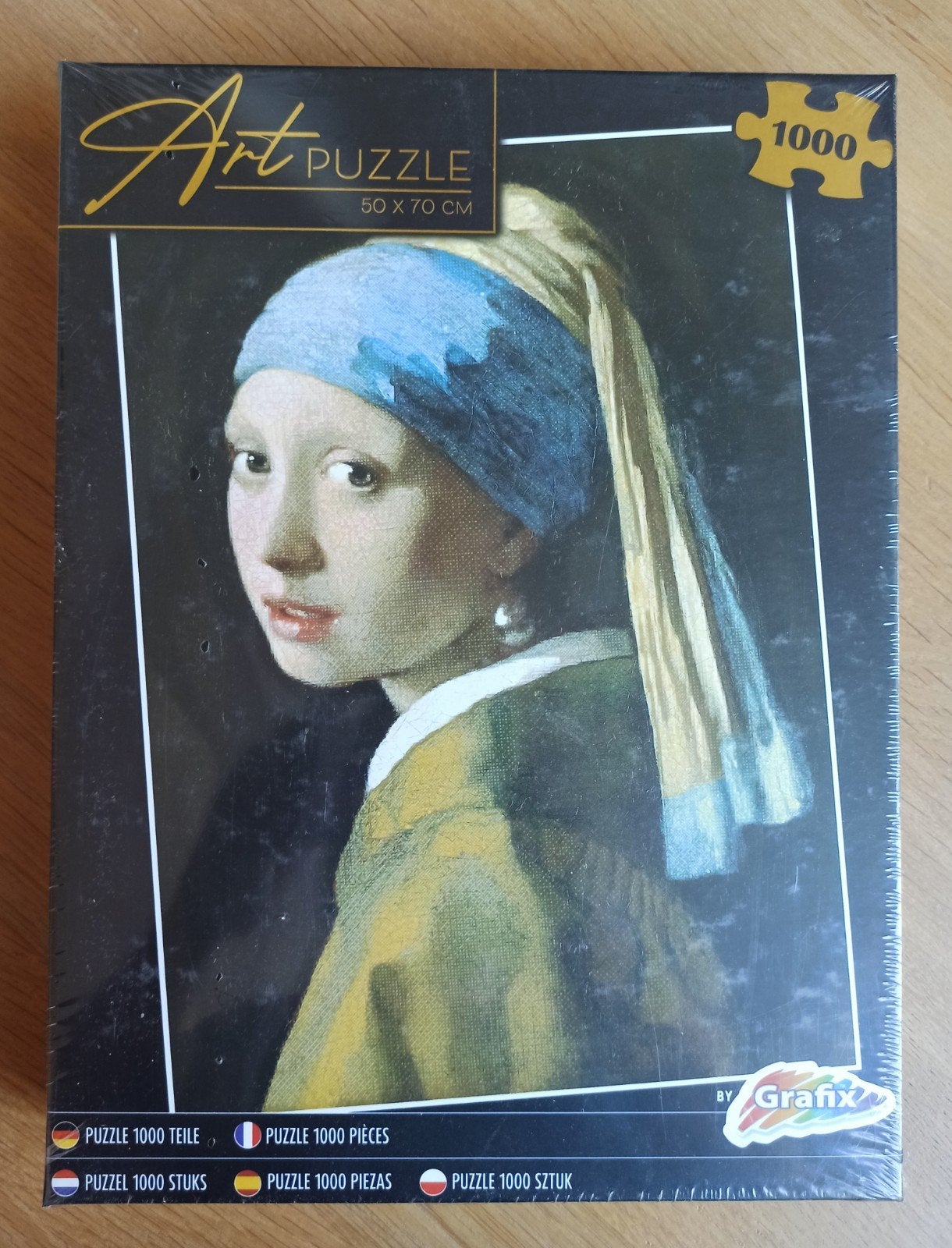 Art Puzzle (1000 stukjes) Meisje met de parel van Johan Verm, Hobby en Vrije tijd, Ophalen of Verzenden, 500 t/m 1500 stukjes
