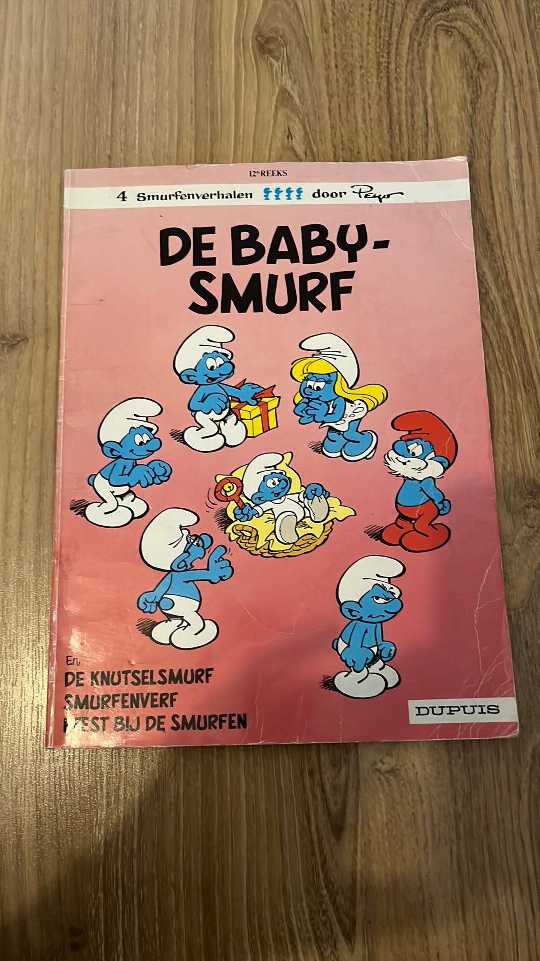 Stripverhaal uit 1984 de babysmurf, Boeken, Ophalen of Verzenden, Gelezen