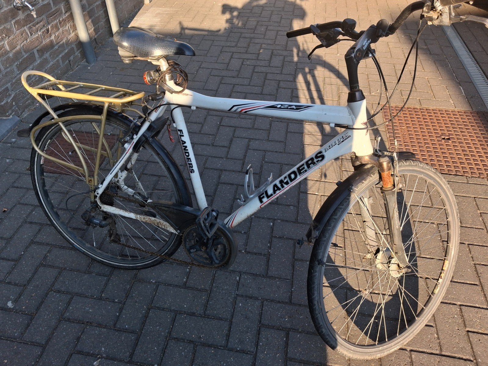 Herenfiets met werk aan, Ophalen