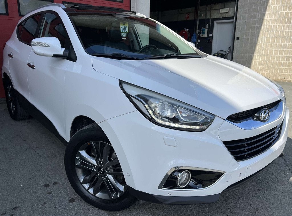 Hyundai ix35 1.6i 2WD Executive +CAR-PASS +CAMÉRA +NAVI +PA, Auto's, Gebruikt, 4 cilinders, Wit, Leder