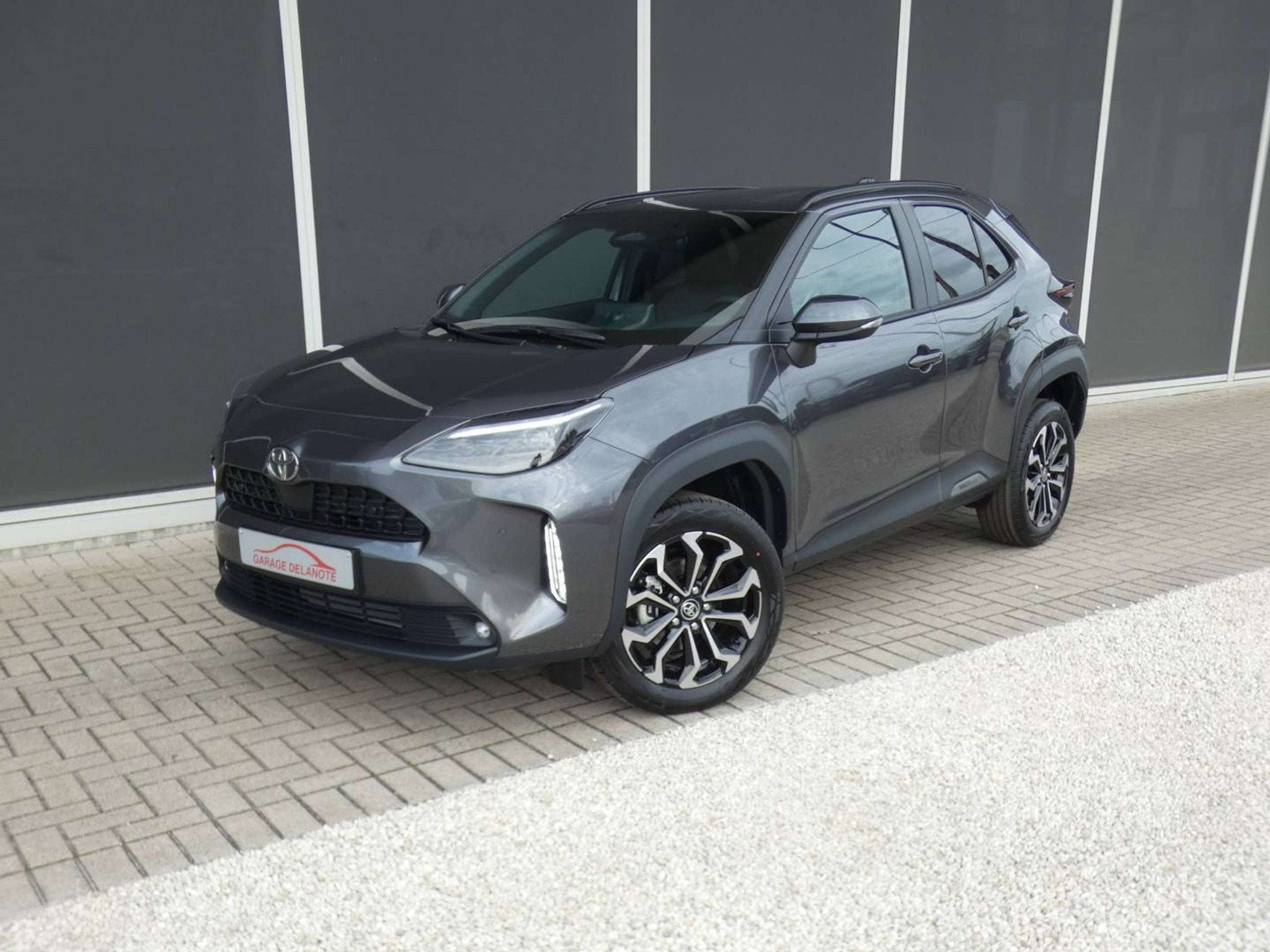 Toyota Yaris Cross Hybrid 130pk +Parkeersensoren +Dodehoek +, Auto's, Stof, Zwart, 1200 kg, 1490 cc