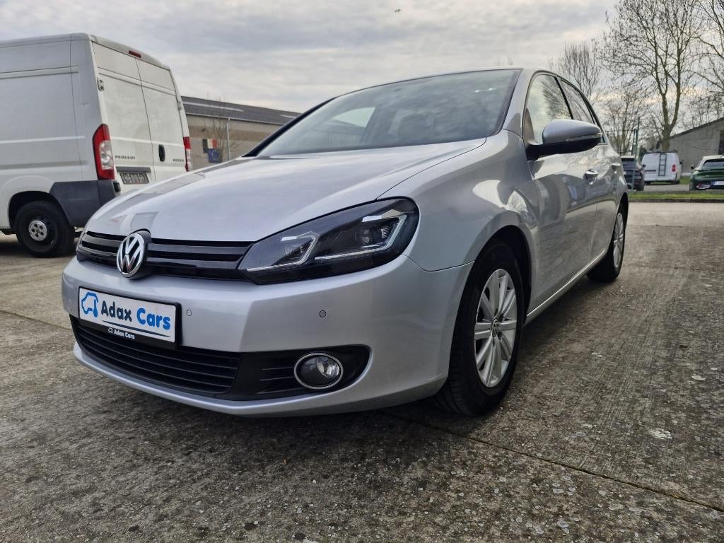 Volkswagen Golf 1.6 TDI 2013 1 jaar garantie, Auto's, Voorwielaandrijving, Euro 5, Stof, Zwart