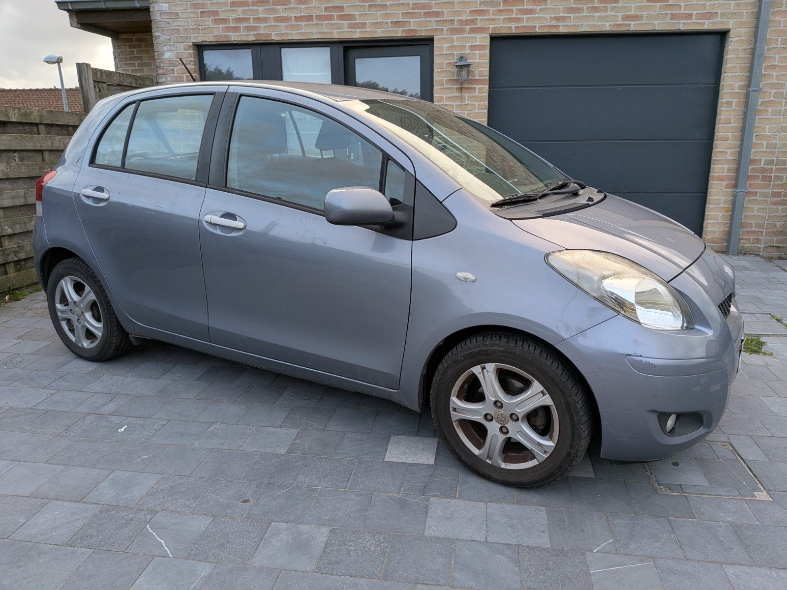 Toyota Yaris lichtblauwe 5deurs, benzine, Auto's, Stof, Blauw, 1329 cc, Bedrijf