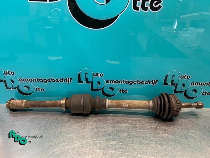 Aandrijfas rechts-voor van een Peugeot 206 (206 98-), Auto-onderdelen, Remmen en Aandrijving, Peugeot, Gebruikt, 3 maanden garantie