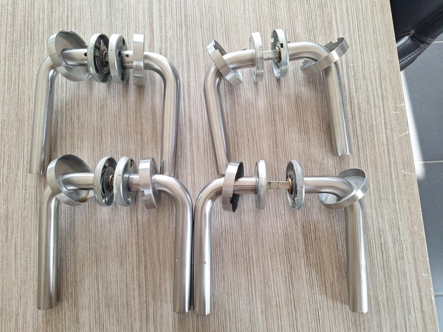 4 complete sets RVS/inox deurklinken met rozetten, Ophalen, Gebruikt, Inox, Klink of Kruk