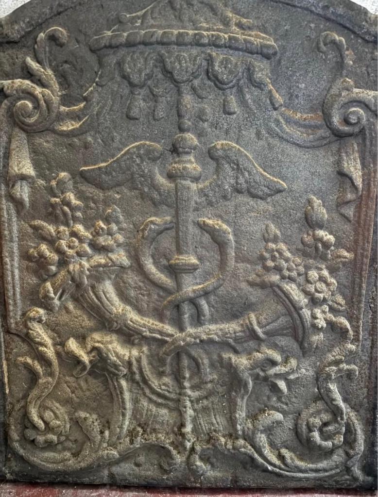Plaque en fonte de cheminé XVIII eme, Enlèvement