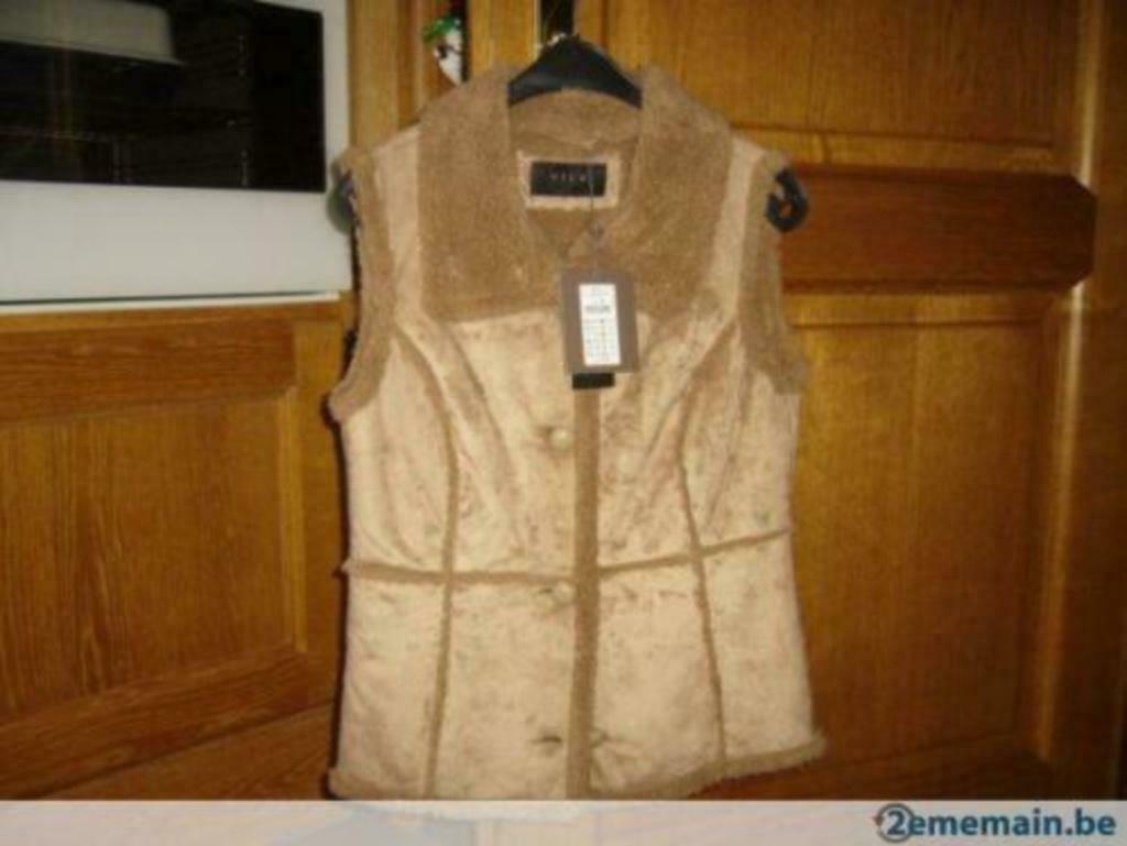 veste sans manche imitation mouton retourné M, Enlèvement