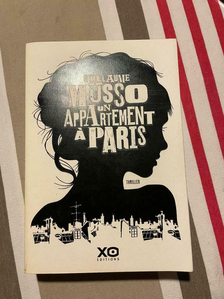 Livre roman UN APPARTEMENT A PARIS G.MUSSO, Ophalen of Verzenden, Gelezen
