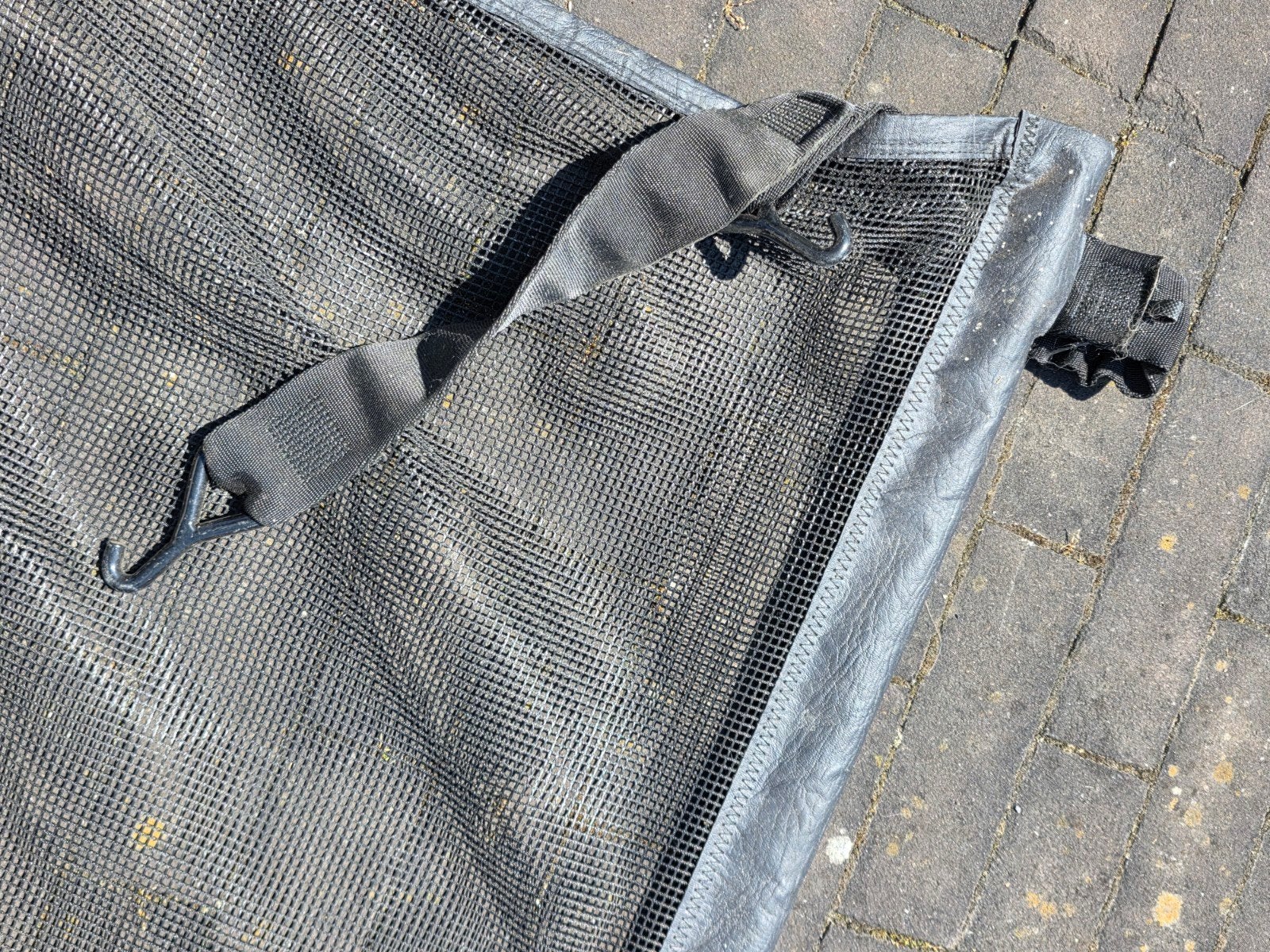 Bagagenet / veiligheidsnet voor kofferruimte, Ophalen