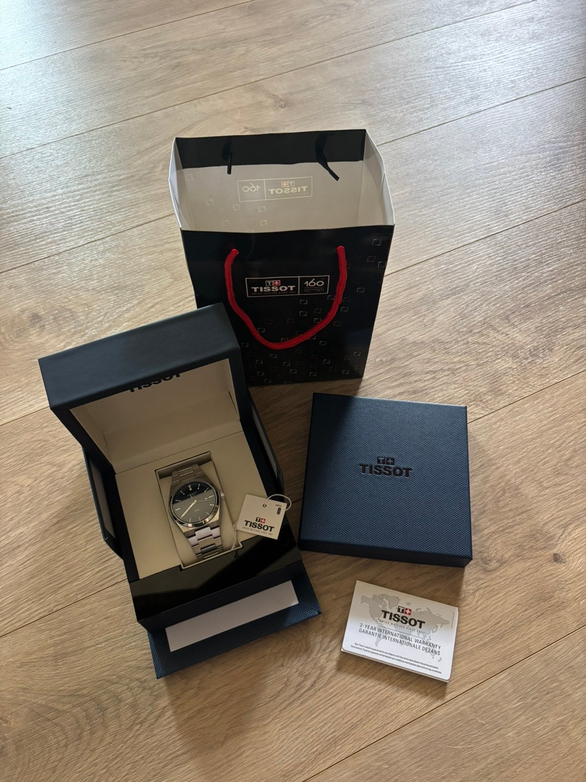 Tissot prx 40mm, Handtassen en Accessoires, Horloges | Heren, Overige merken, Staal, Staal, Polshorloge