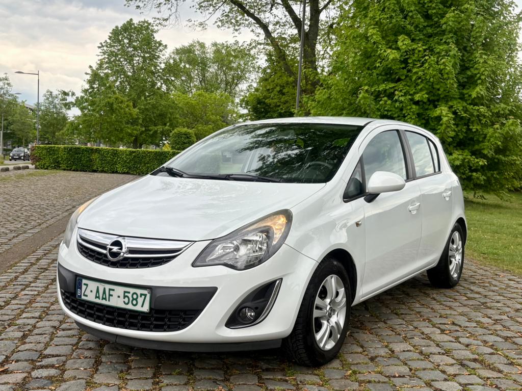 Opel Corsa 1.2 Benzine 7/2014, Auto's, Opel, Euro 5, Zwart, Leder en Stof, Wit