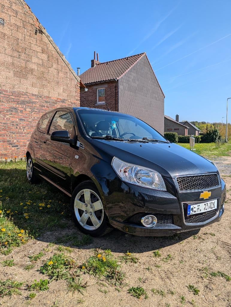 Chevrolet Aveo Hatchback zwart, Auto's, Chevrolet, Voorwielaandrijving, Zwart, Handgeschakeld, Particulier