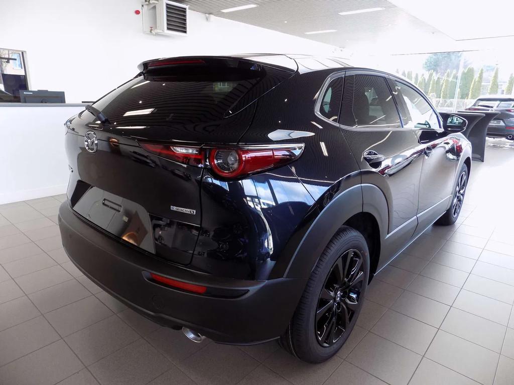 Mazda CX-30 2.0i SKYACTIV-X Homura Automaat, Auto's, Automaat, 1998 cc, Stof, Zwart
