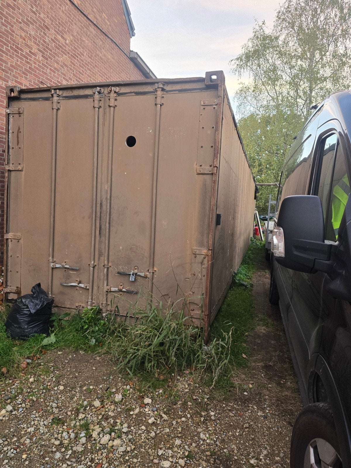 container 40ft (12meter lang) met werk aan, Ophalen