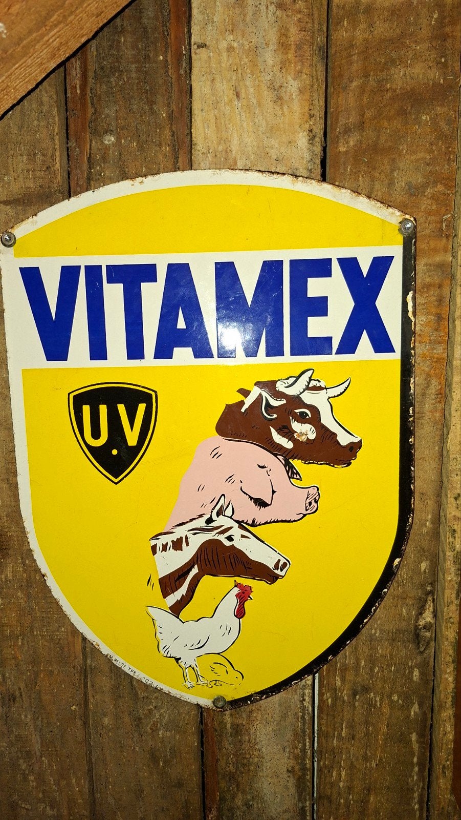 Emaille bordje Vitamex Baasrode, Ophalen