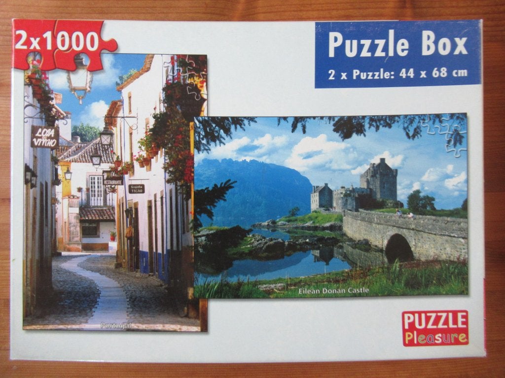 Doos met 2 leuke volledige puzzels van 1000 stukjes, zgan, Hobby en Vrije tijd, Ophalen, 500 t/m 1500 stukjes, Zo goed als nieuw