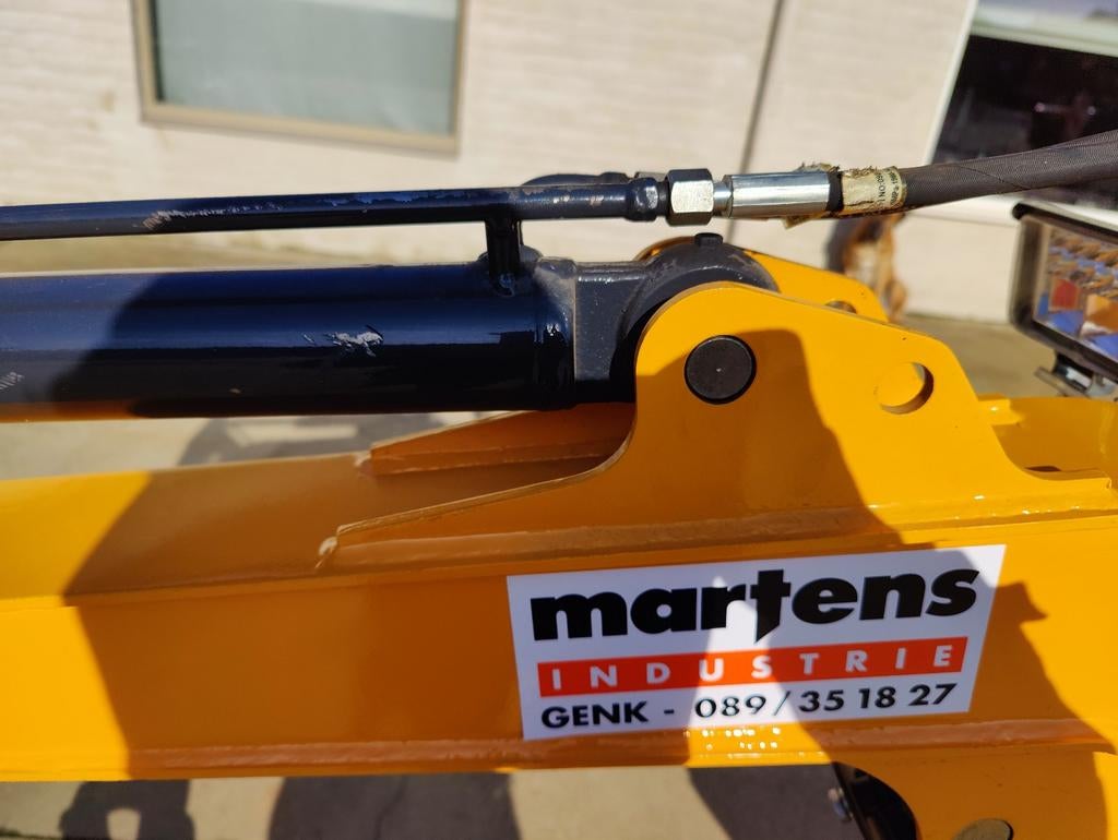 Nieuwe minigraver graafmachine, Ophalen