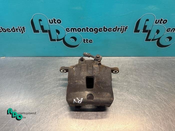 Remklauw (Tang) rechts-voor van een Opel Astra (Astra J 10-), Gebruikt, -, -, Opel