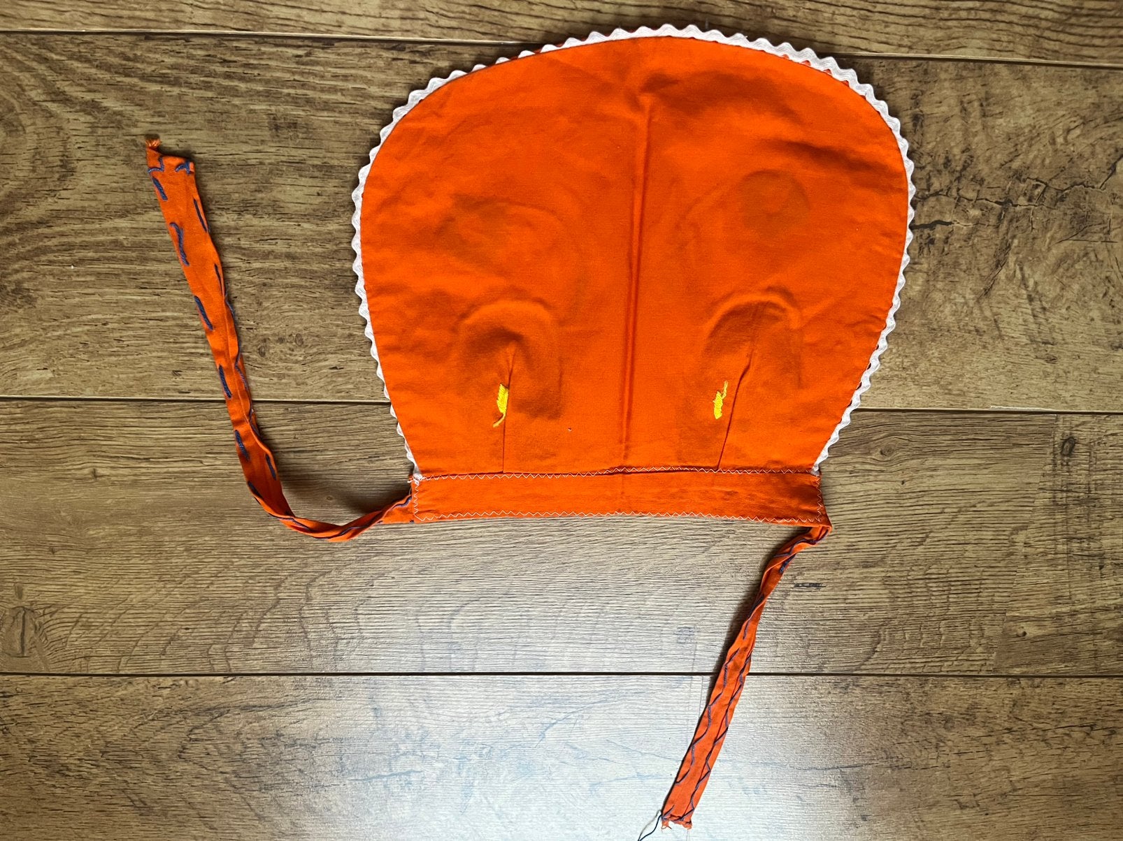 Kinderschortje Meli, Enfants & Bébés, Enlèvement ou Envoi, Comme neuf, Autres types, Orange