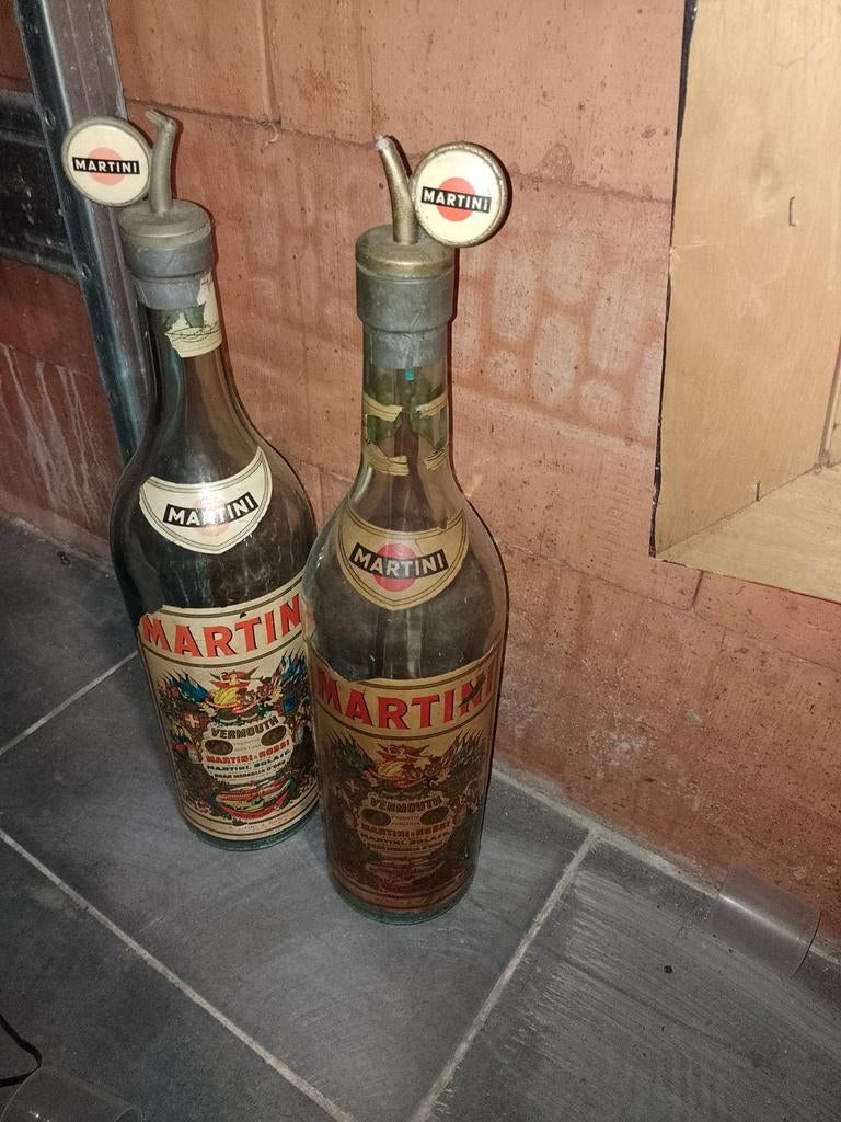 Grote flessen martini, Enlèvement