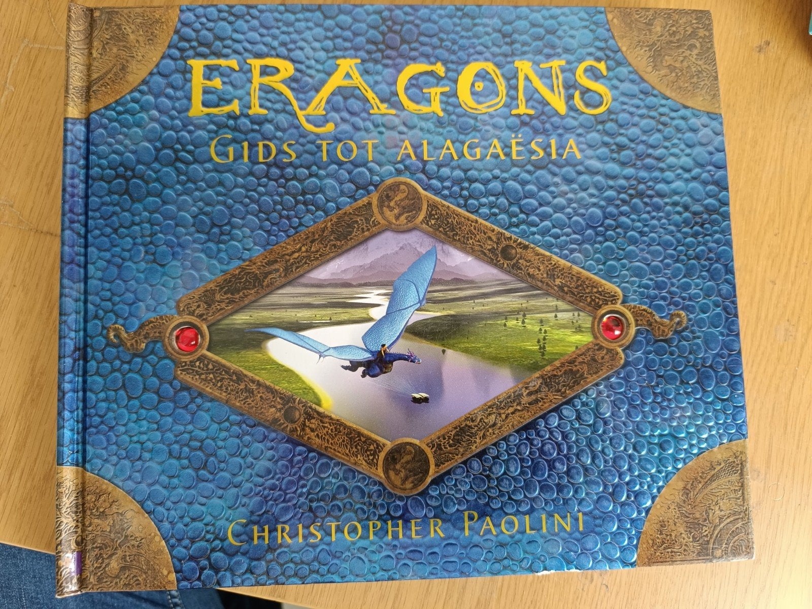 Christopher Paolini - Eragons gids tot Alagaesia, Boeken, Ophalen of Verzenden, Christopher Paolini