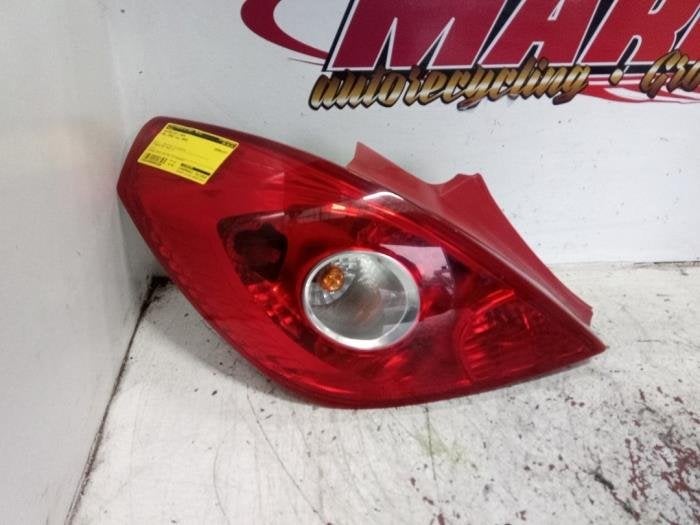 Achterlicht links van een Opel Corsa, Gebruikt, -, -, -