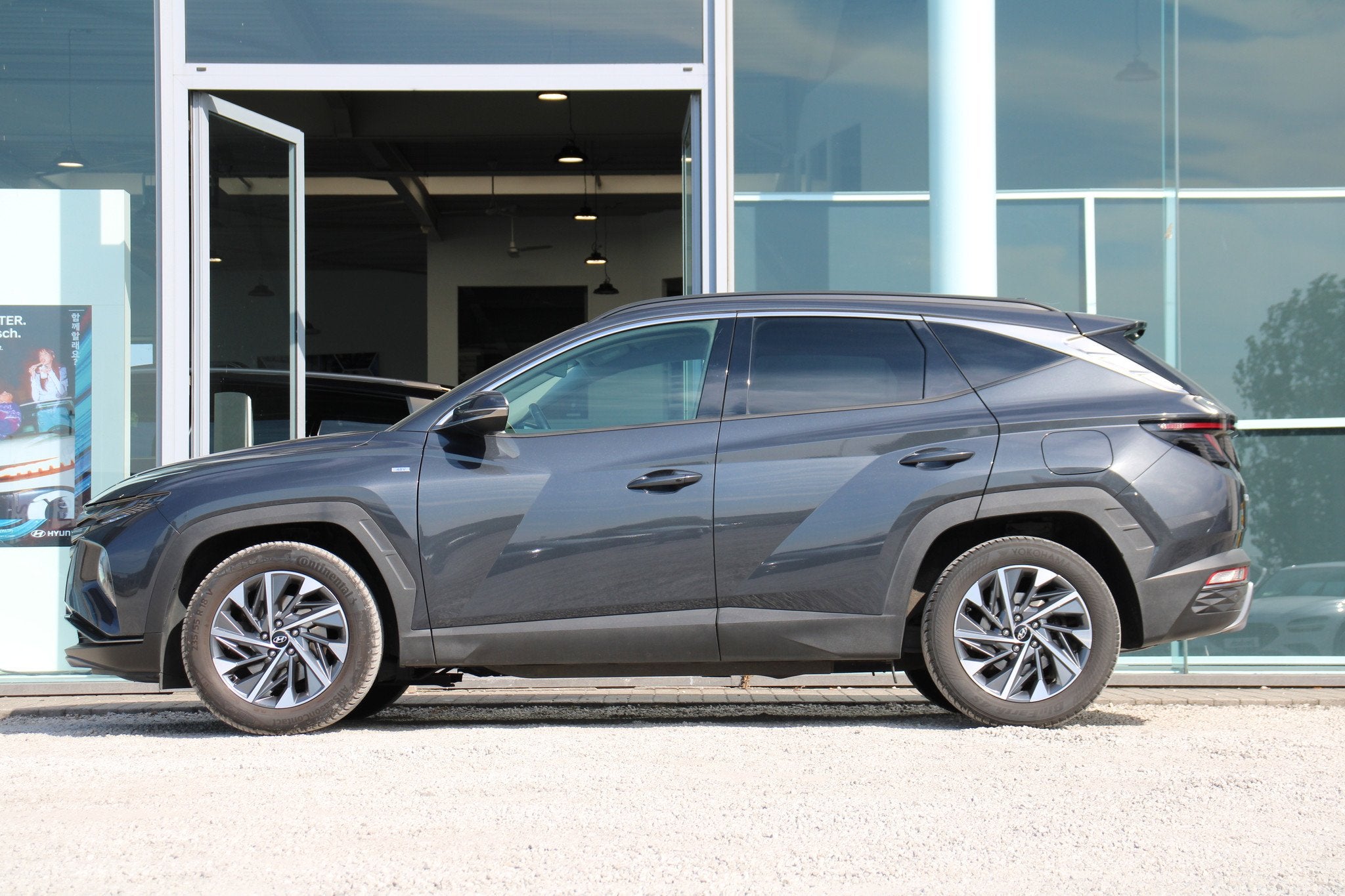 Hyundai Tucson 1.6T 48V Feel Comfort Automaat *LEDER*CAM*, Gebruikt, Bedrijf, 5 deurs, Hybride Elektrisch/Benzine