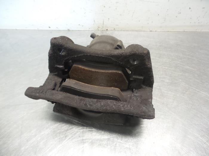 Etrier de frein (pince) avant gauche d'un Nissan Micra (Micr, -, 3 mois de garantie, Utilisé, -