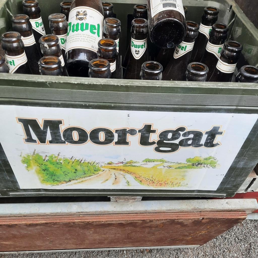 Duvel - Moortgat bak . Lege flesjes . 15 jaar oud ., Ophalen of Verzenden, Zo goed als nieuw, Flesje(s), Duvel