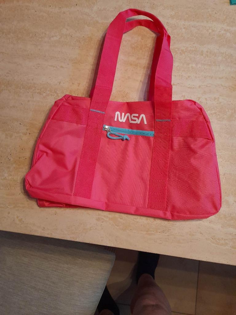 Roze tas 'International Space Archives' 100% polyester, Handtassen en Accessoires, Tassen | Damestassen, Ophalen of Verzenden