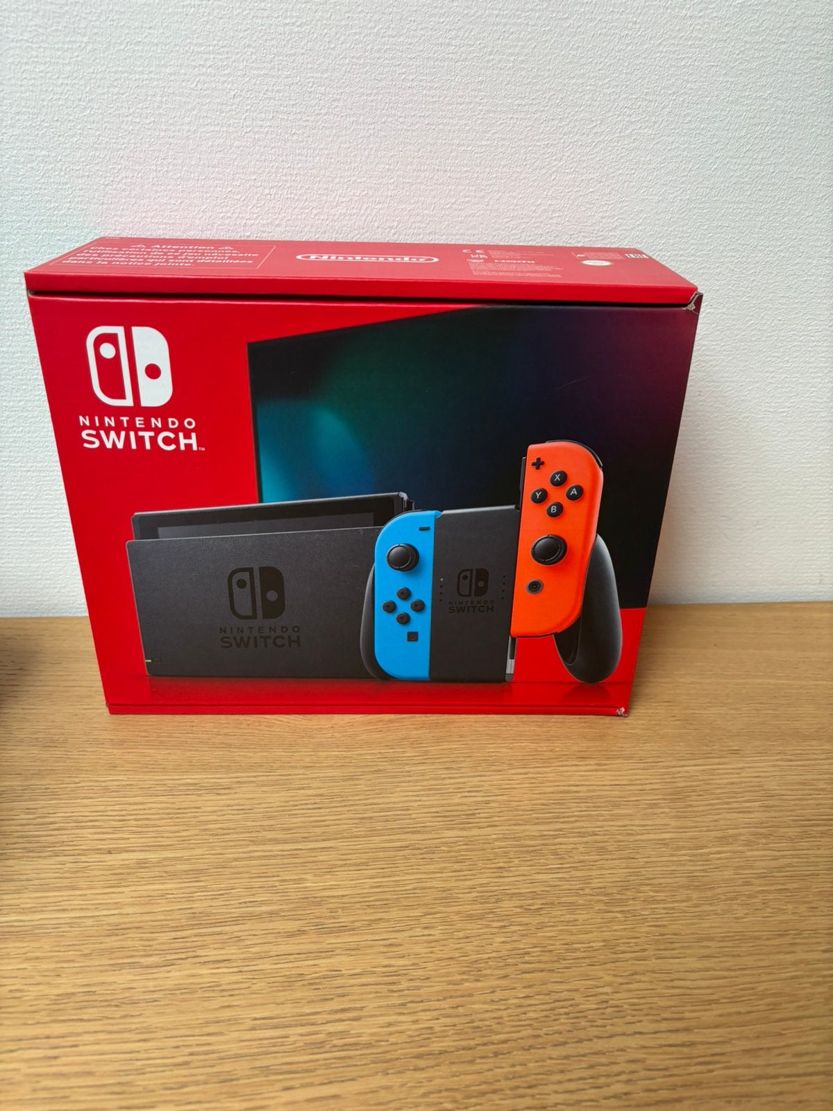 Nintendo Switch V2 bleu fluo/rouge — neuf et inutilisé, Consoles de jeu & Jeux vidéo, Avec disque dur, Enlèvement ou Envoi, Avec 2 manettes