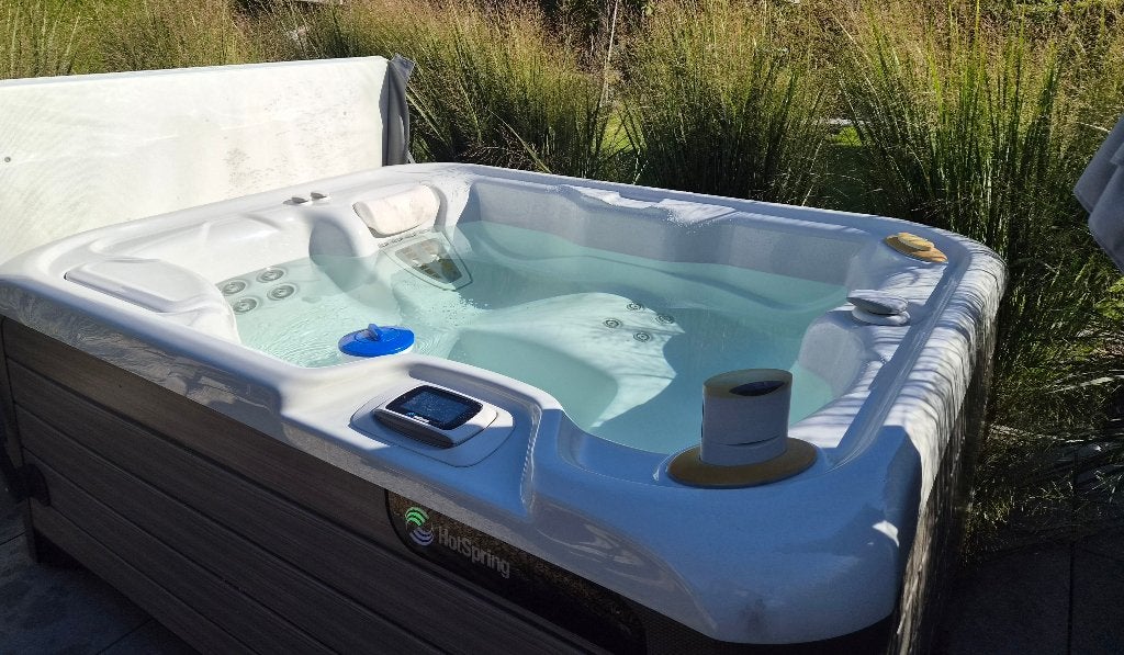 Jacuzzi - merk Hotspring, Ophalen, Gebruikt, Afdekzeil, Vast