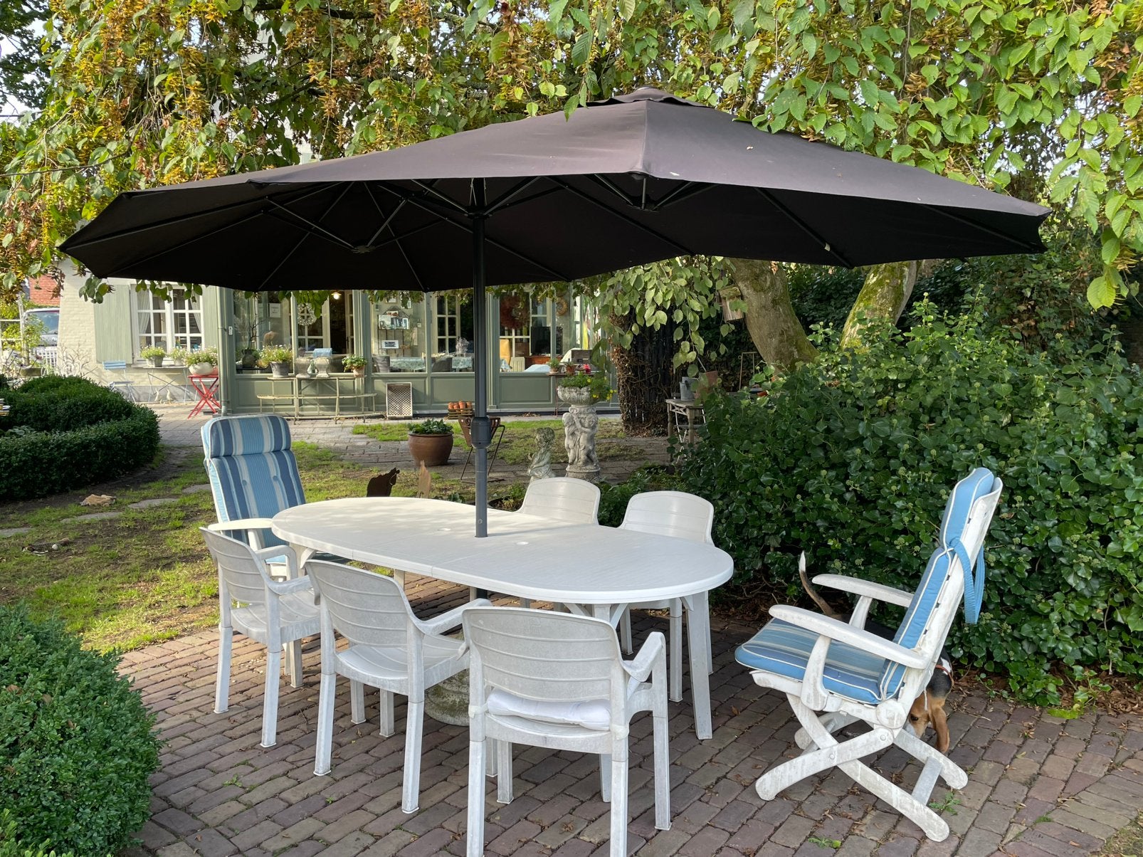 Tuinset: tafel & 7 stoelen & grote ovale parasol, Ophalen, Gebruikt