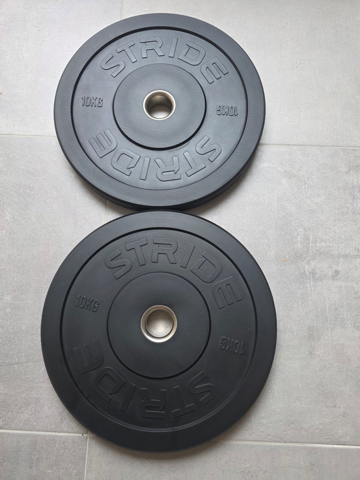 NEW STRIDE Bumperschijven 2x10 kg zwart rubber — Ø50 mm, Sport en Fitness, Fitnessmaterialen, Ophalen of Verzenden, Nieuw, Benen