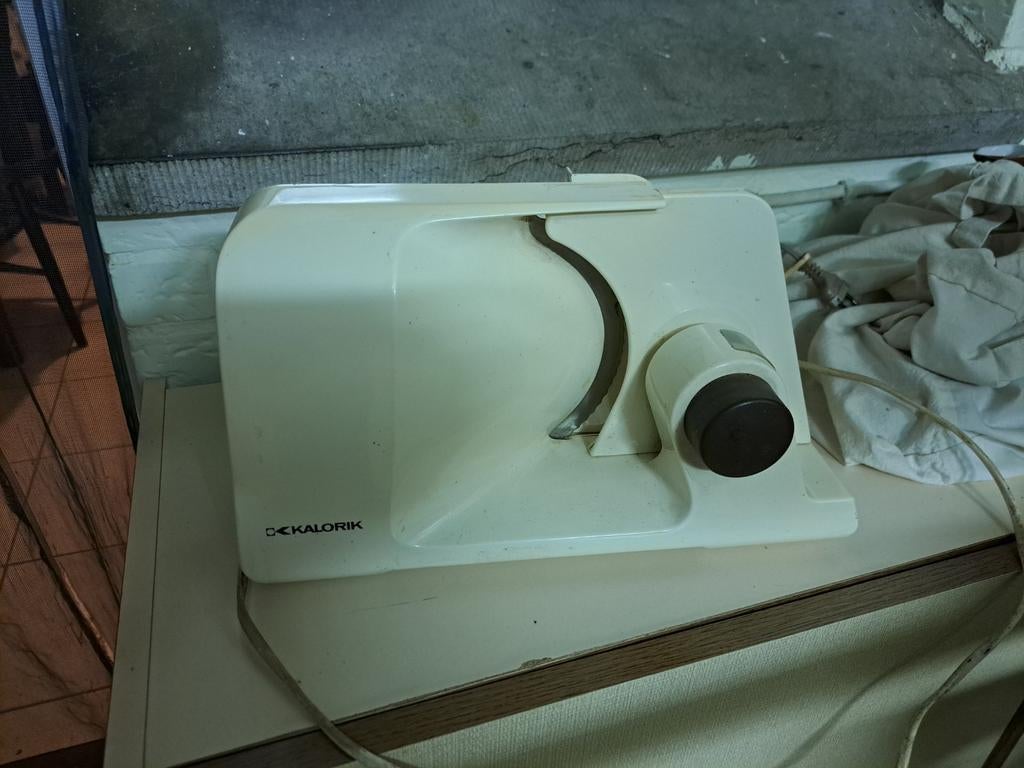 Snijmachine Kalorik, Ophalen