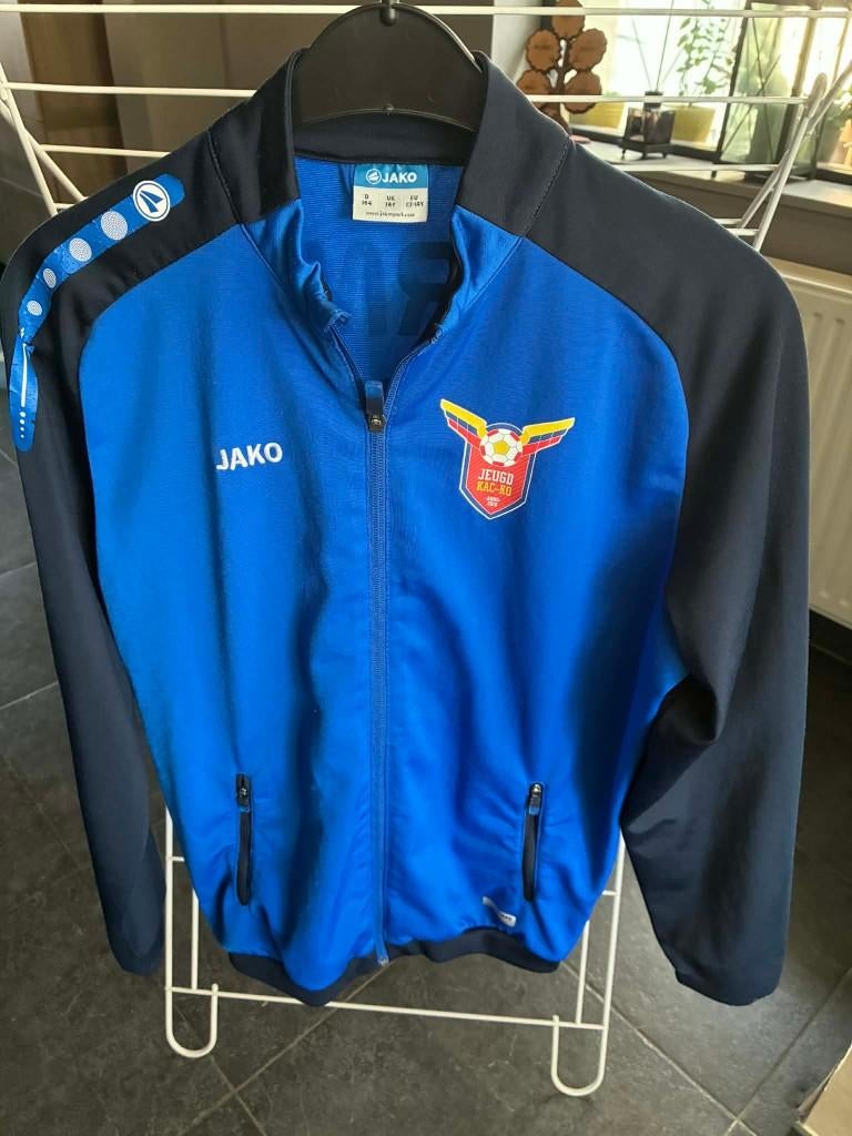 Jako blauwe trainingsvest maat 13-14 jaar, Enlèvement ou Envoi, Comme neuf