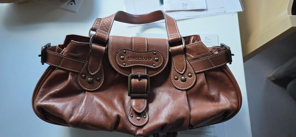 Sac à main longchamp, Enlèvement
