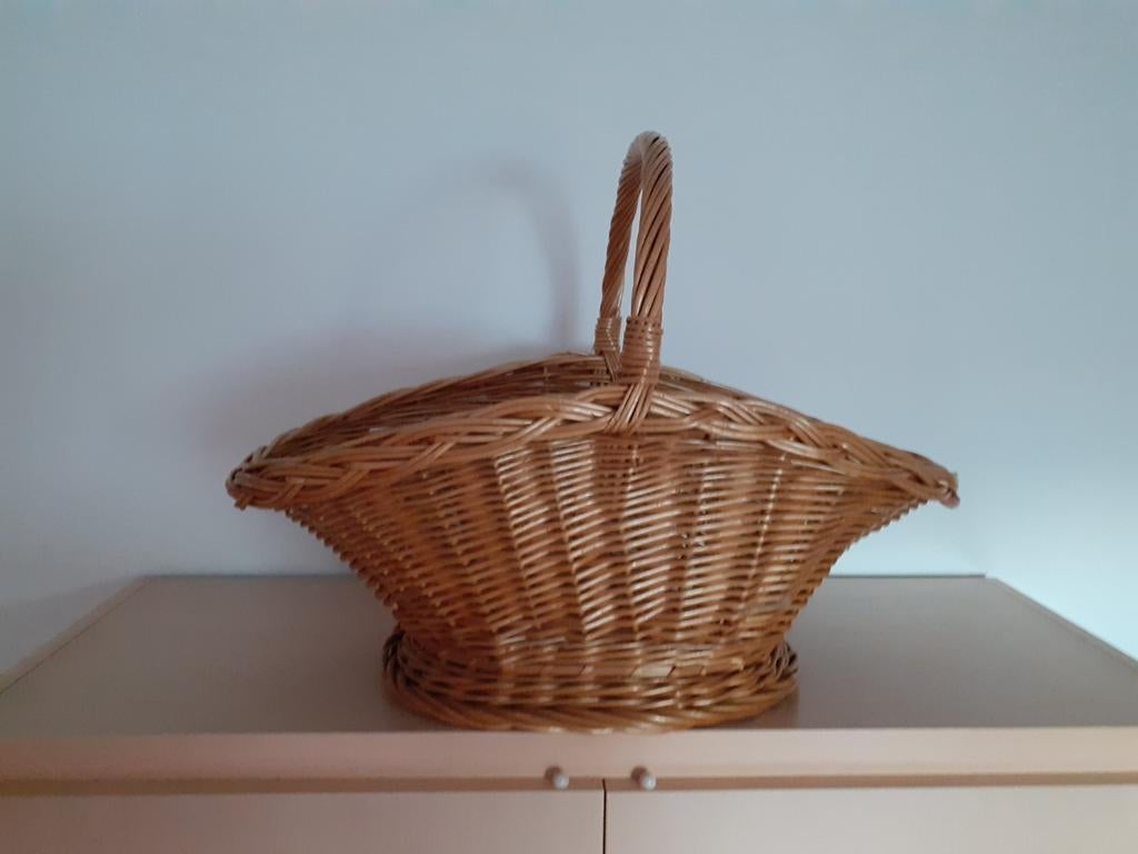 Rieten draagmand, Ophalen