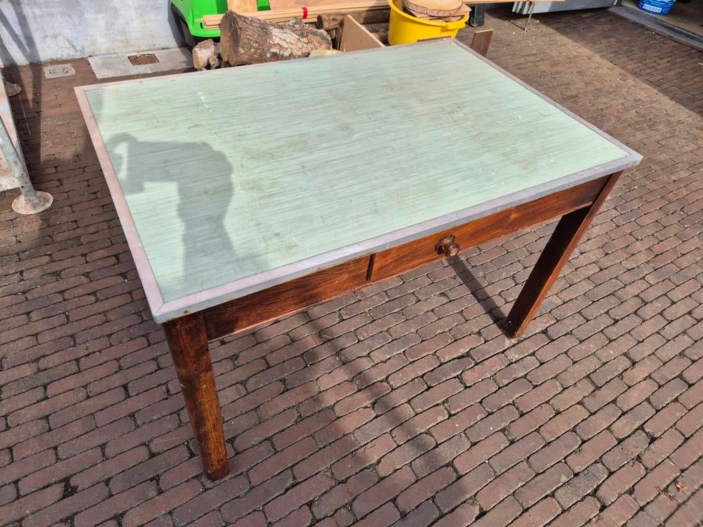 Houten keukentafel, Ophalen