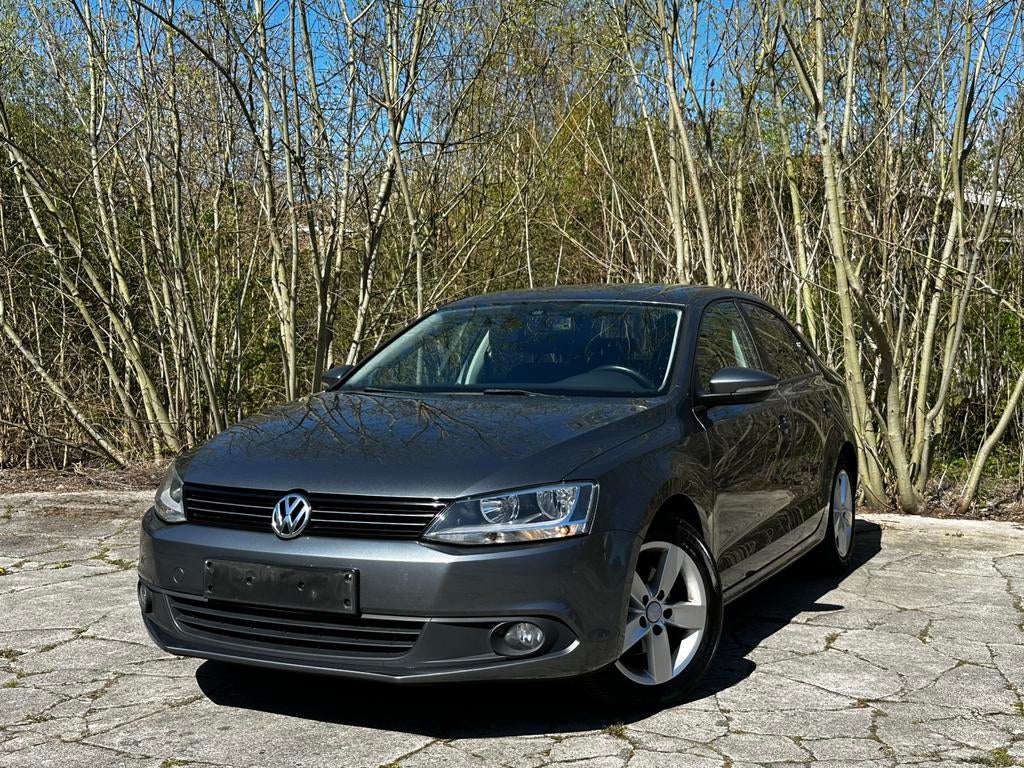 Volkswagen Jetta 1.6 TDI — 143.700 km — Garantie, Auto's, Voorwielaandrijving, Stof, Zwart, 4 cilinders